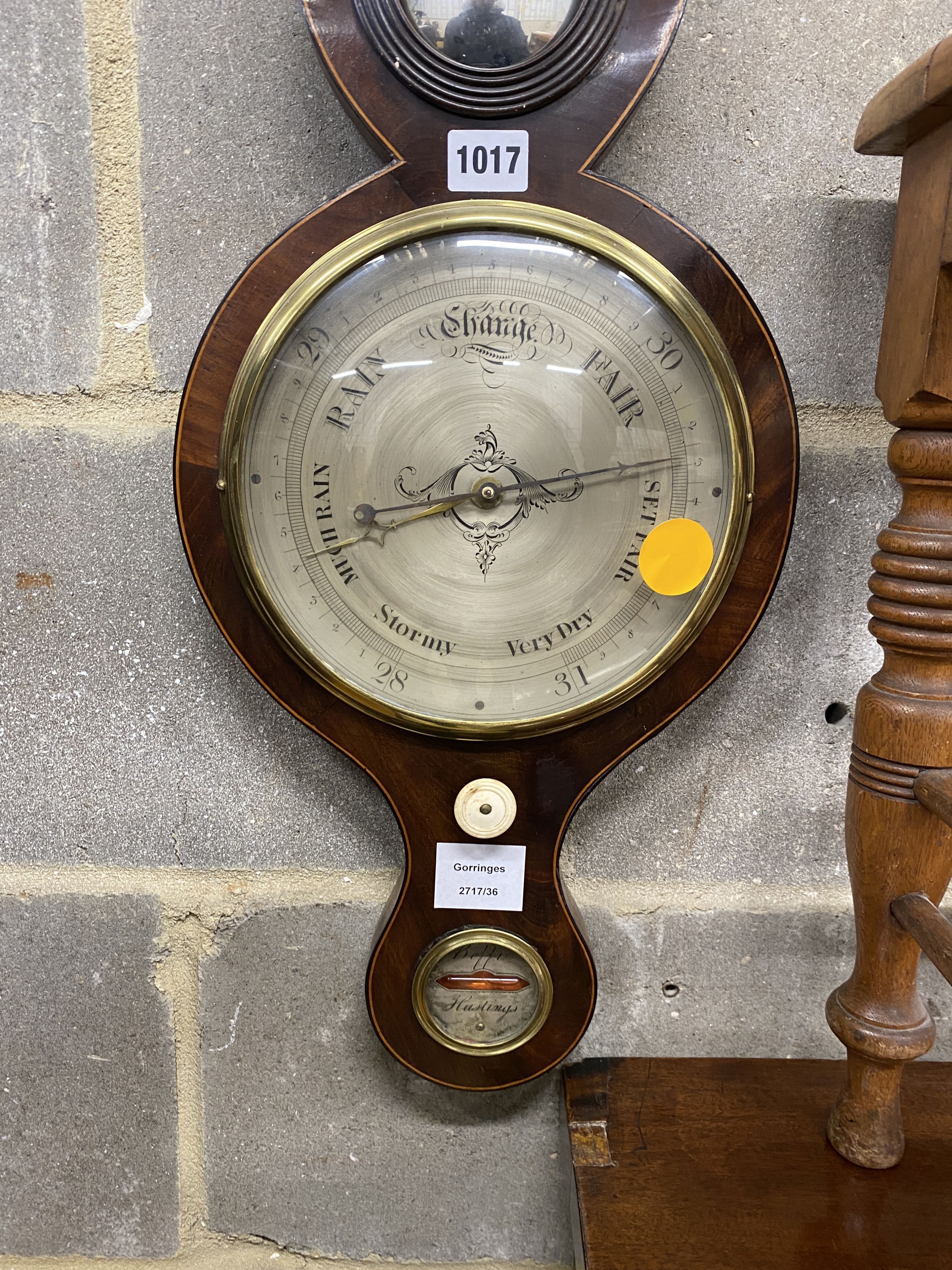 An early 19th century mahogany wheel barometer marked Beffi, Hastings, height 96cm